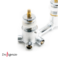 A close-up studio image of the outlet side of an Insignia thermostatic shower mixer valve, showing multiple threaded outlet ports extending from the chrome-plated valve body. These outlets distribute water to the different shower functions found in an Insignia steam shower, shower cabin, or steam shower bath, such as overhead showers, hand showers, or body jets. The image clearly displays the internal brass threading and robust construction, helping homeowners identify the correct Insignia replacement valve for their shower system.